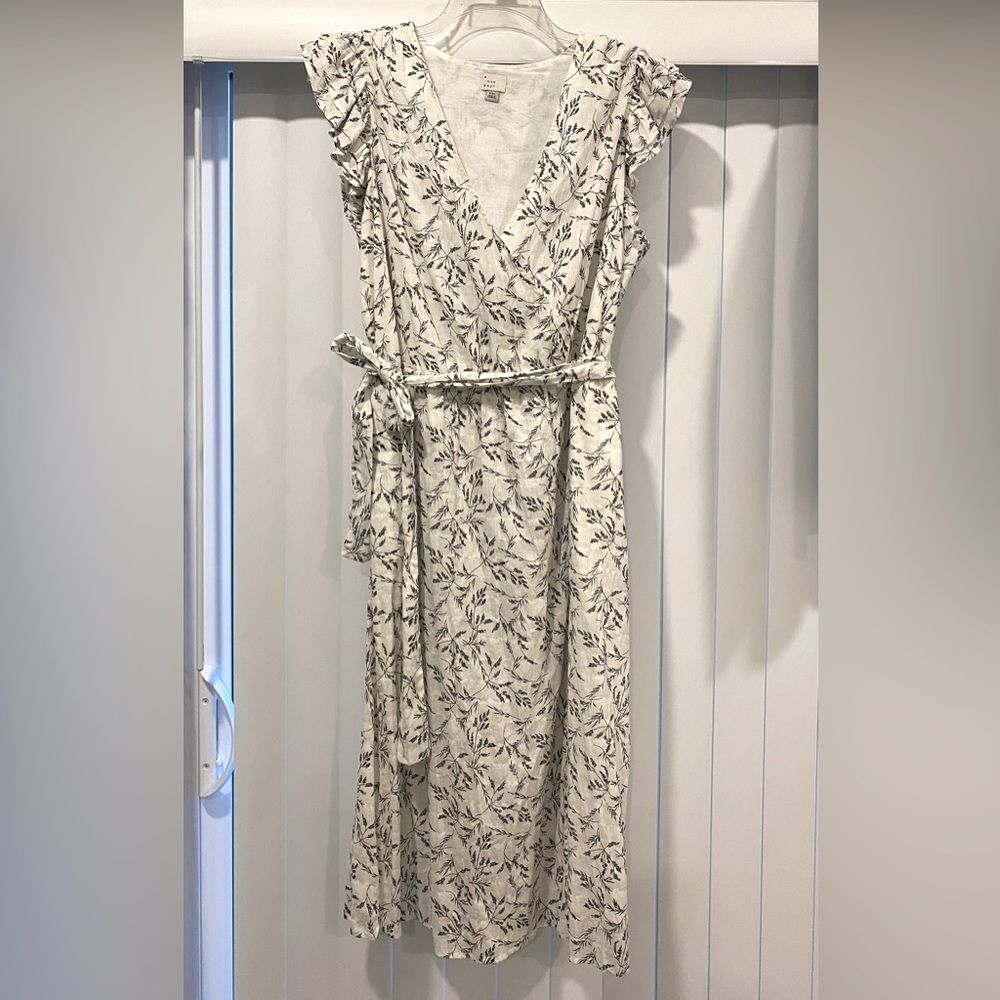 Midi length, faux wrap dress